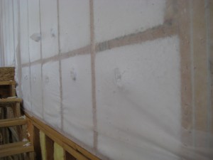 <img scr=” Spray-Fiberglass-over-barrier.jpg” alt=”Spray fiberglass  insulation in walls, Kansas City, Murray Insulation”>